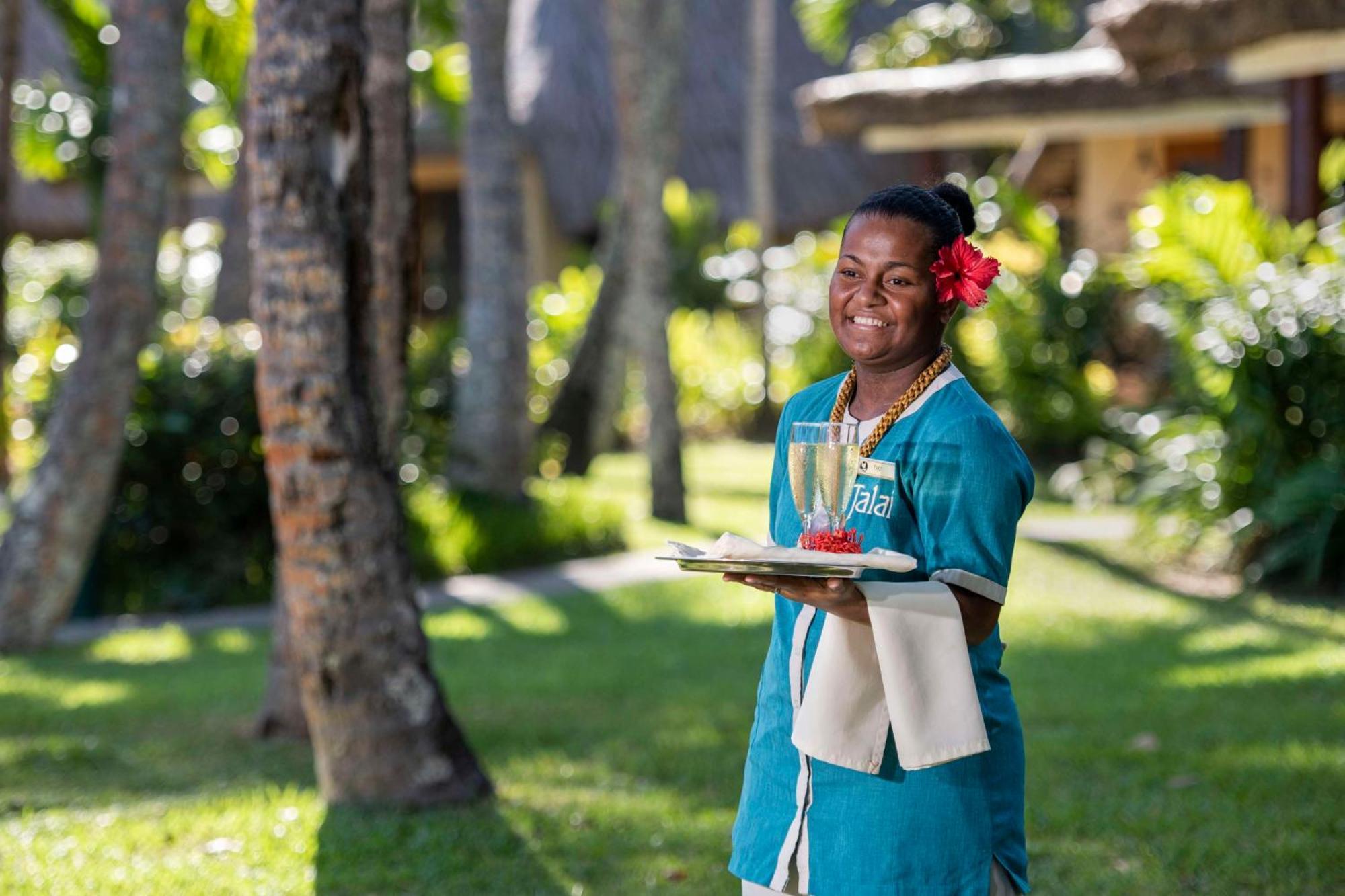 Outrigger Fiji Beach Resort Korotogo Eksteriør bilde A hotel staff in Mauritius